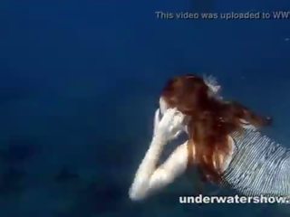 Nastya swimming nude in the sea