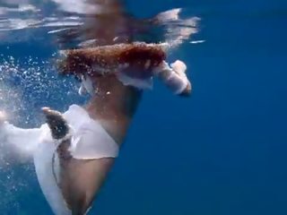 Julia swimming nude in the sea